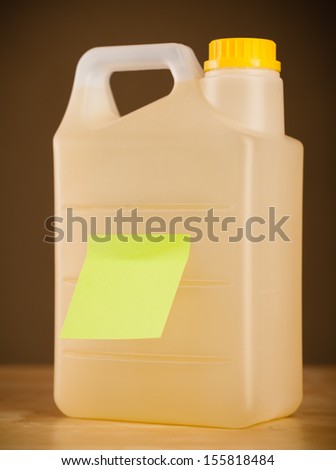 Gallon with empty sticky note
