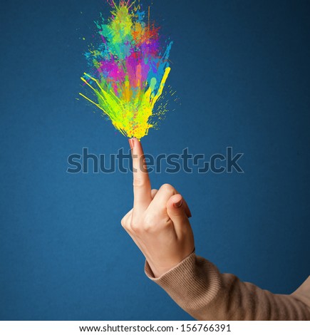 Colored splashes are coming out of gun shaped hands