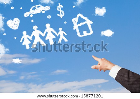 Hand pointing with finger at family and household clouds on blue sky