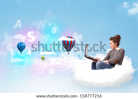 Pretty young woman sitting in cloud with laptop, balloons and letters concept
