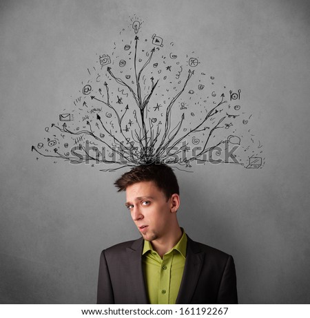 Young businessman thinking with tangled lines coming out of his head