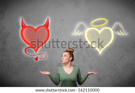 Pretty young woman standing and deciding between the angel and the devil heart