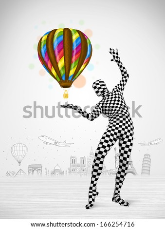 Funny man in full body suit holding colorful balloon, tourist attractions in background