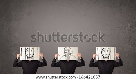 Men in formal gesturing with a drawn prisoner on cardboard in front of their head