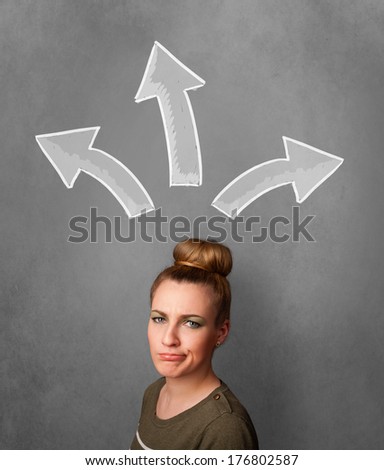 Pretty young woman deciding with sketched arrows above her head
