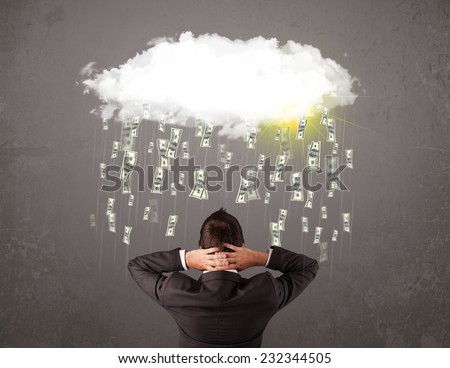 Business man in suit looking at cloud with falling money and sun