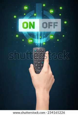 Hand holding a remote control, on-off signal coming out of it