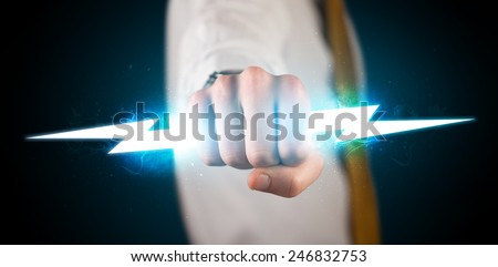 Business man holding glowing lightning bolt in his hands concept - Stock  Image - Everypixel