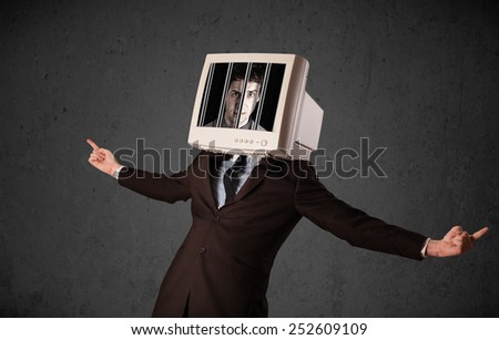 Business man with monitor screen on his head traped into a digital system concept