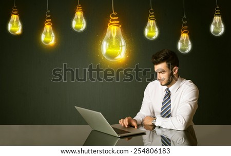Businessman sitting at the black table with idea bulbs on the background