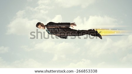Happy business man flying fast on the sky between clouds concept
