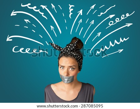 Young woman with taped mouth and white drawn lines and arrows around her head