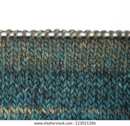 Knitted pattern with knitting needle