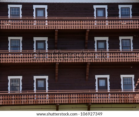 Windows and balcony of old hotel building