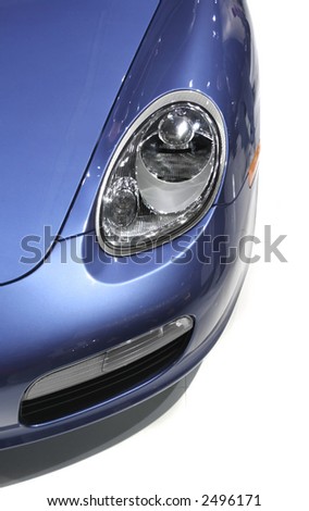 Head lamp of blue Porche car
