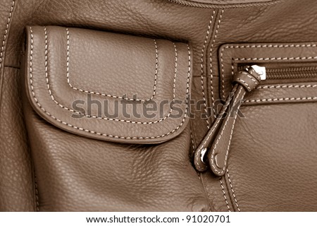 Zipper and pocket on Ladies hand bag