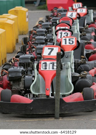 Row of go karts waiting to go out onto the track