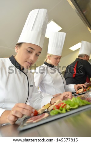 Young people in cooking training class