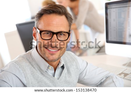 Portrait of smiling businessman with eyeglasses