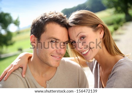 Sweet couple enjoying week-end in countryside
