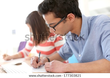 Student filling application form for business school