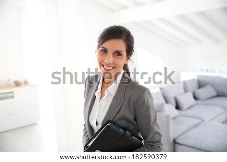 Real estate agent ready to present house to client