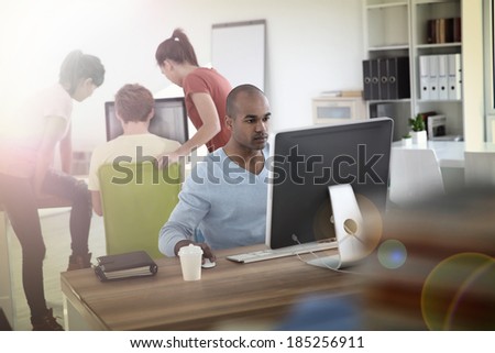 Man working on desktop computer