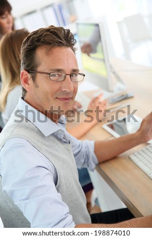 Attractive 40-year-old man in business training