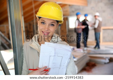 Young woman in construction professional training