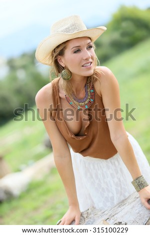 Attractive woman; model with cowgirl style