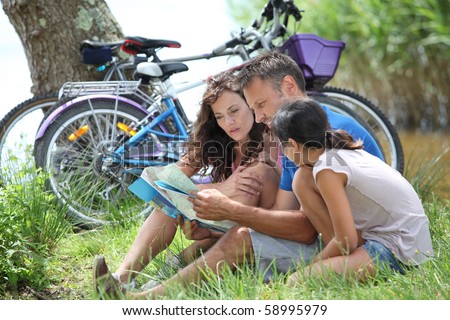 Family on bicycle ride in the countryside
