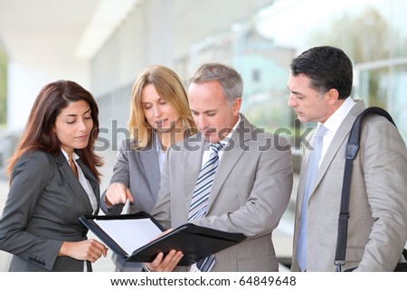 Business people meeting at an exhibition