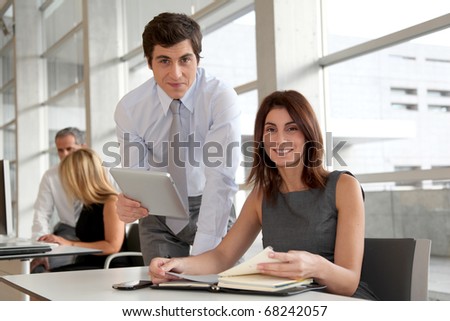 Business people working in the office with agenda