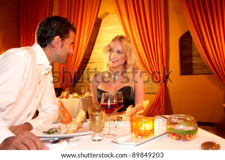 Couple dining in a fancy restaurant