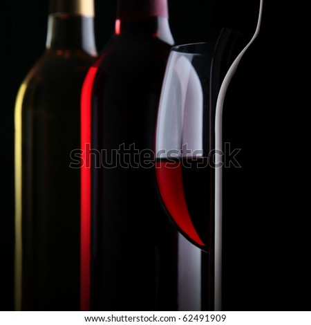 Bottles of wine on black background Stockfoto © 