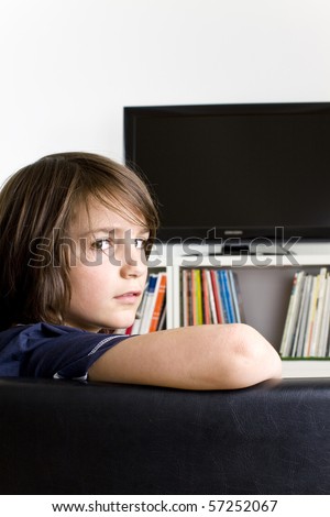 Boy in watching TV Stock foto © 