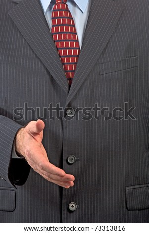 Businessman extending hand for handshake
