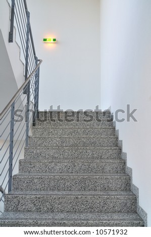 Staircase in the office with emergency light.