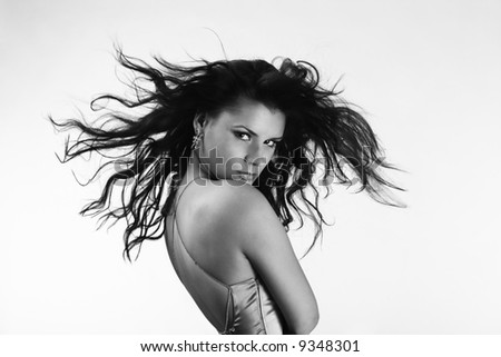 Attractive woman with beautiful windy hair