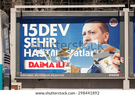 ISTANBUL, TURKEY - MAY 10 2015 : Torn billboards about election dated March 30th 2014