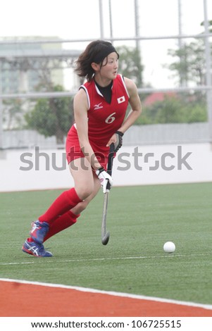 PATHUMTHANI,THAILAND - JUNE 27 : Unidentified player in Women\'s Junior PTT Asia Cup 2012 Between Japan (R) vs Pakistan (G) on June 27, 2012 at National Hockey Trainging Center in Pathumthani,Thailand