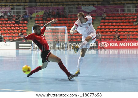 BANGKOK, THAILAND - NOVEMBER 06: Unidentified players in FIFA Futsal World Cup Group E match between Egypt and Czech Republic at Indoor Stadium Huamark on November 6, 2012 in Bangkok, Thailand.