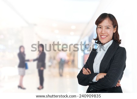 Portrait of young asia business woman in her office