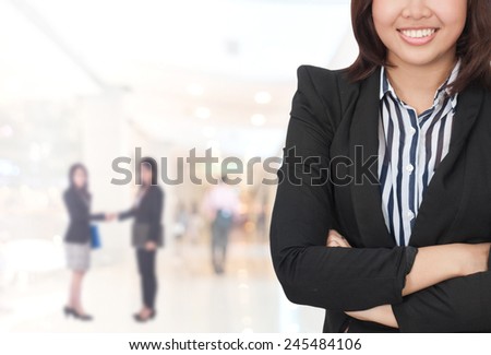 Portrait of young asia business woman in her office.