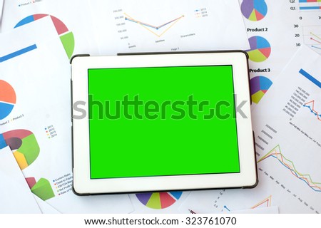 smartphone display green sceen ,business finance, tax, accounting, statistics and analytic research concept