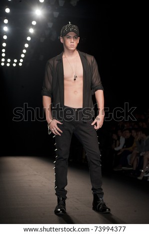 THAILAND -MAR 26: A model walks the runway for 27Nov collection presentation for Fashion Networking during Bangkok International Fashion Week 2011 on March 26, 2011 in Bangkok, Thailand