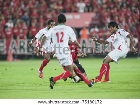 THAILAND- APRIL 12: AFC CUP between Muang Thong utd (Red) vs Victory sc  (white) on April 12, 2011 at Thunderdoma Stadium Nonthaburi, Thailand