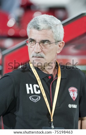 THAILAND- APRIL 12:H.Calisto Head coach Muang Thong in  the AFC CUP Group G between Muang Thong UTD (Red) vs Victory SC (white) on April 12, 2011 at Thunderdome Stadium in Nonthaburi, Thailand