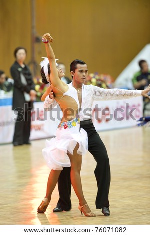 BANGKOK - APR 24: A.Nakluang and A.Kuptawanith during TDSA/IDSF Open (Standard & Latin) Dance Sport Championship 2011 on April 24, 2011 in Bangkok, Thailand.