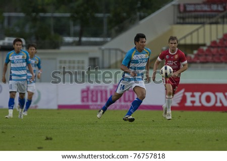 BANGKOK, THAILAND- MAY 7: P.Pechviset in action during Thai Premier League (TPL) between BEC Tero Fc (Red) vs Pataya Utd. (Blue) on May 7, 2011 at thebhussadin Stadium in Bangkok, Thailand